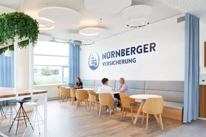 NÜRNBERGER office. Employees working and talking each other