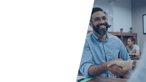 Man shaking hands and smiling