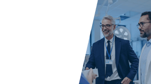 a senior pharmaceutical salesman speaking with doctors