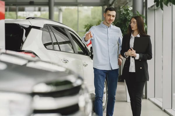 Retorio sales rep selling car