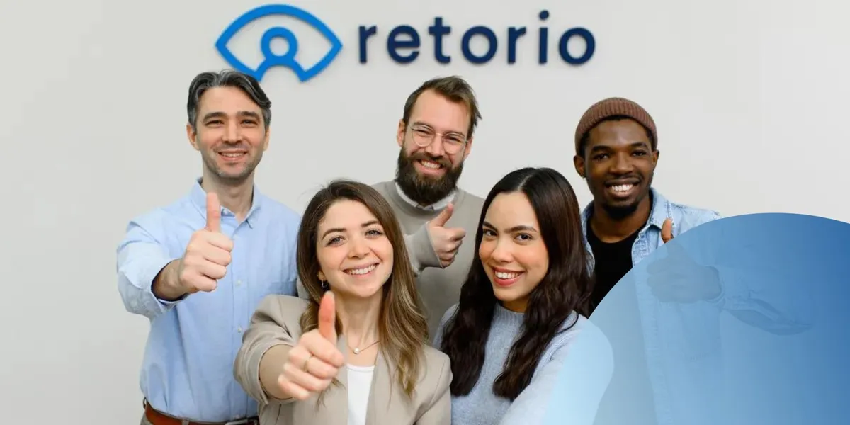 Retorio group of employees thumbs up
